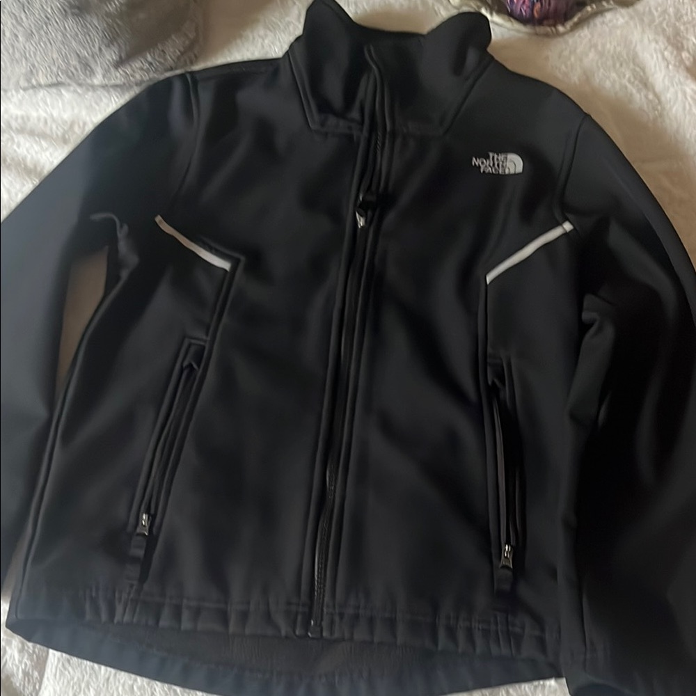 The  North Face Black Softshell Jacket with White Trim